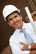 Photo: Engineer with blueprints Engineer with blueprints