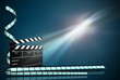 clap board ant film strip on dark blue background clap board ant film strip on dark blue background