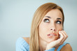 Photo: pensive woman biting lips pensive woman biting lips