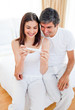 Smiling couple finding out results of a pregnancy test