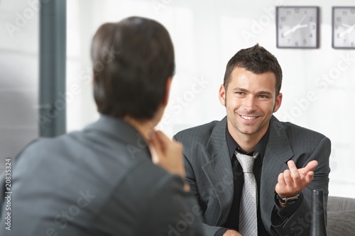 Photo: Business people talking Business people talking