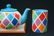 Colourful teapot and mug