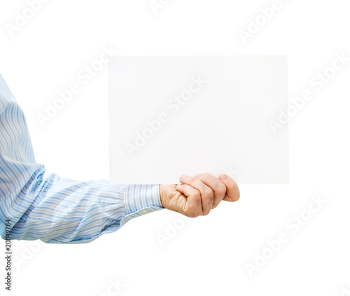 Photo: Pure white card in man's hand Pure white card in man's hand