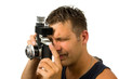 man with old fashioned photo camera over white background