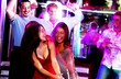 Young adults at a nightclub dancing