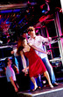 Young adults at a nightclub dancing