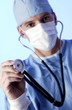Physician holding stethoscope Physician holding stethoscope