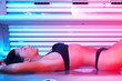 Foto: Young woman in solarium Young woman in solarium