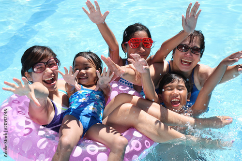 Photo: happy people at the pool happy people at the pool
