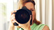 Video: Mature female photographer taking a photograph Mature female photographer taking a photograph