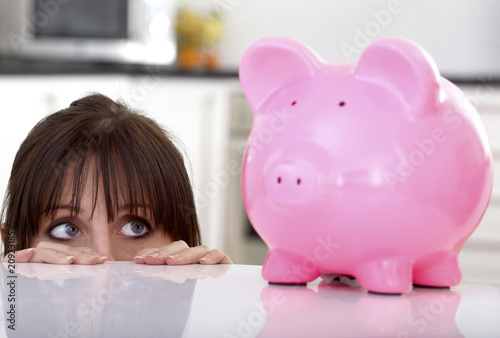Photo: girl scared of her savings girl scared of her savings