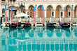 Beautiful picture of Venetian gondolas and blue water Beautiful picture of Venetian gondolas and blue water
