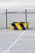 Metal fence and Restricted Area Sign at the airport cargo area