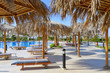 Beauty landscape of sun umbrella, make of reed, pool.