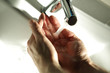 Washing hands in a sink