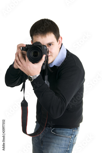 Photo: The photographer on a white background The photographer on a white background