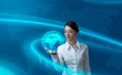 Attractive brunette holding virtual globe Attractive brunette holding virtual globe