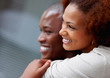 Closeup of a black man piggybacking a cute girl