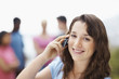 Closeup of a pretty young girl talking on a mobile phone