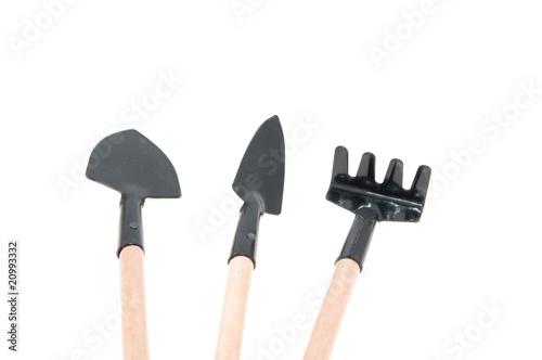 Photo: Garden tools isolated over white Garden tools isolated over white