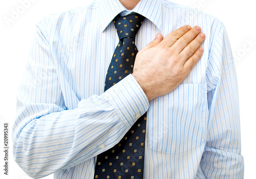 Photo: Businessman Lawyer with hand on heart Businessman Lawyer with hand on heart