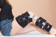 Adjustable support for leg or knee injury