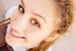 Girl with dreadlocks laughs