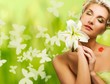 Beautiful young woman with fresh flowers in her hair. Beautiful young woman with fresh flowers in her hair.