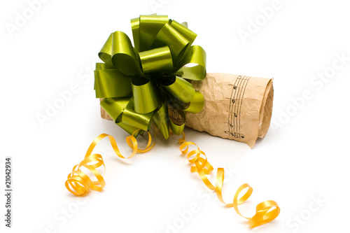 Photo: notes with a bow on a white background notes with a bow on a white background