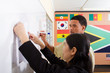 teacher teaching student chinese characters