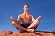Man meditating outdoors