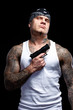 Tattooed gangster with gun Tattooed gangster with gun