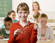 Student holding helix in classroom