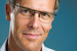 Smiling mature man with glasses