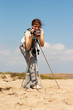 girl with camera and tripod