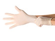 Hands of person putting on a medical glove isolated on white