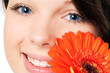Photo: Girl with blue eyes and a flower Girl with blue eyes and a flower