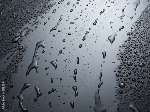 Foto: Wassertropfen auf schwarz glänzendem Hintergrund Wassertropfen auf schwarz glänzendem Hintergrund