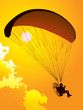 Silhouette of a paraglider at sunset Silhouette of a paraglider at sunset