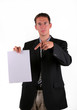 Business man show document as proof Business man show document as proof
