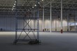 Empty warehouse with scaffold