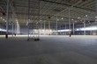 Empty warehouse with scaffold