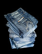 Pile of denim jeans