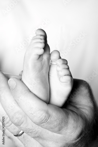 Photo: hands and baby feet hands and baby feet