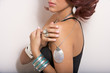 female model wearing silver jewelry earrings pendant bands