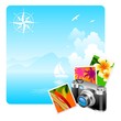 Camera and travel pictures against a idyllic landscape