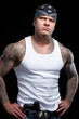 Tattooed gangster with gun Tattooed gangster with gun
