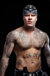 Tattooed gangster with gun Tattooed gangster with gun