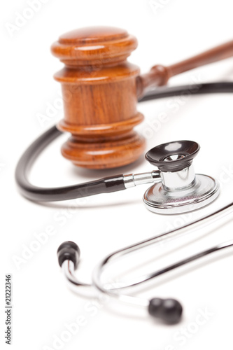 Photo: Black Stethoscope and Gavel on White Black Stethoscope and Gavel on White