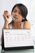 Woman looking at pregnancy test